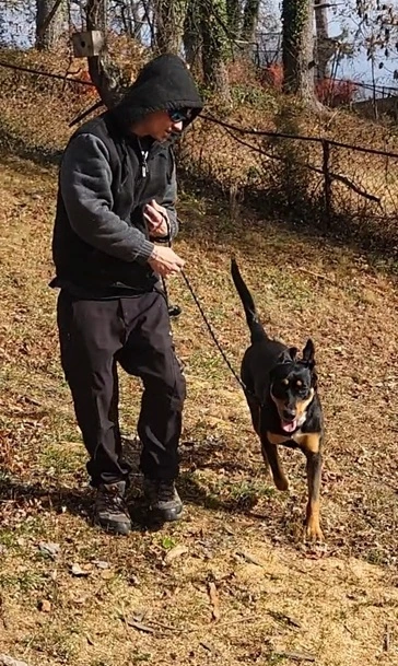 Co-Founder Spray and his Rottweiler mix Oakley