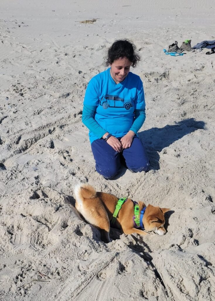 Nicole, part of the professional dog care team at Zoomies.